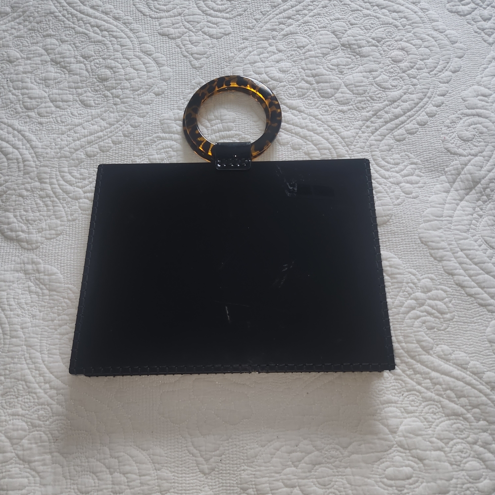 Elegant Black Handbag with Tortoise Shell Handle